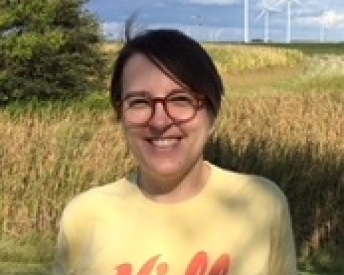 portrait in front of a corn field