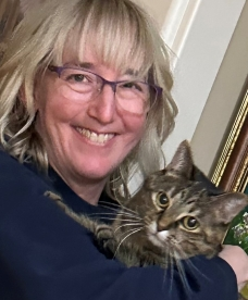 photo of Anne holding the family cat.