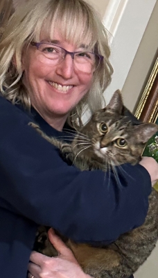 photo of Anne holding the family cat.