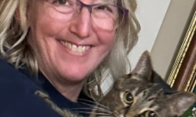 photo of Anne holding the family cat.