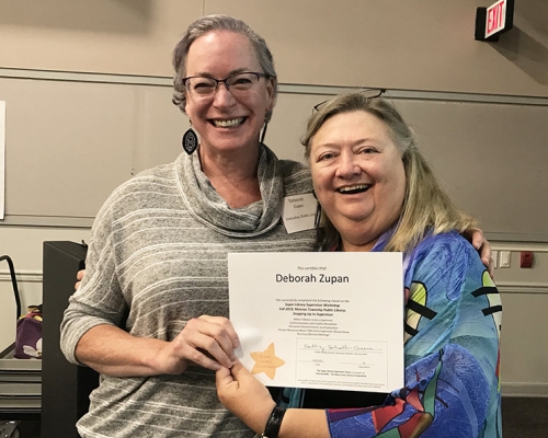 Super Library Supervisor (SLS) Graduation, October 3, 2019 --- (From the left) Deborah Zupan (SLS) and Kathy Schalk-Greene