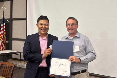 Completion certificate for LLNJ’s PM Fundamentals + AI Integration Bootcamp, presented by Sam Sena (left) to David Costa, Sparta Free Public Library