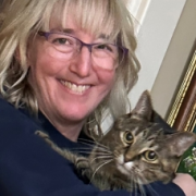 photo of Anne holding the family cat.