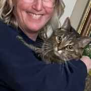photo of Anne holding the family cat.